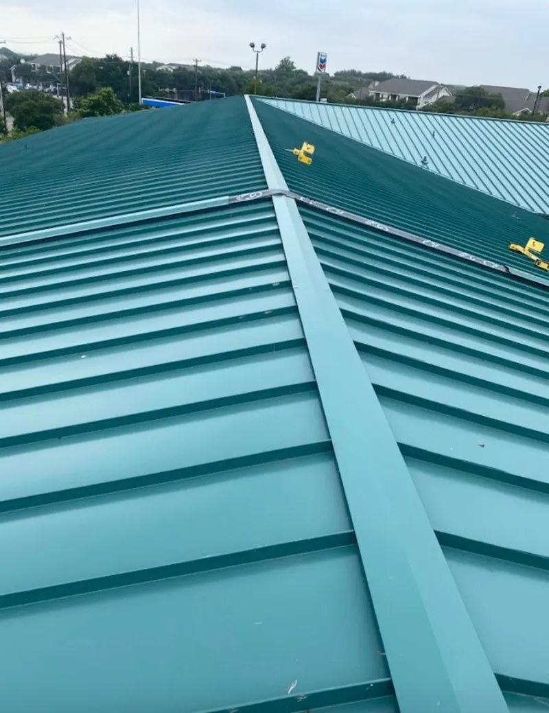 Green commercial metal roof ridge and valley for Metal Roof Repair in Center Line