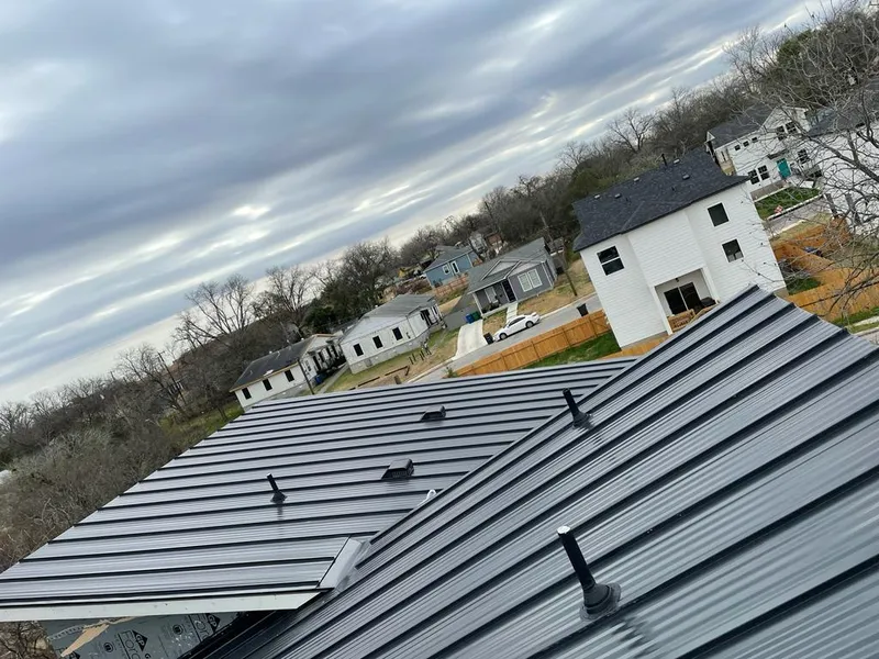 Standing seam metal roof panels with vents for Skylight Repair in Center Line